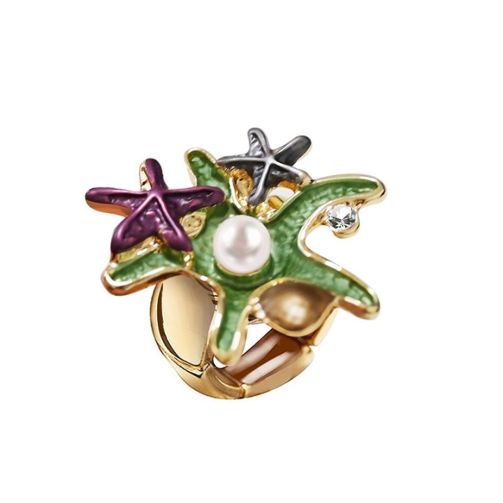 Anello Elastico con Stelle Marine Smaltate E Perla Verde